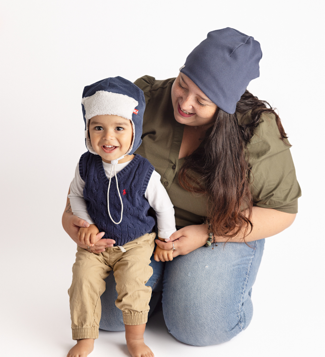 Navy blue corduroy baby pilot hat with sherpa lining and chin strap, side view, Made in Canada
