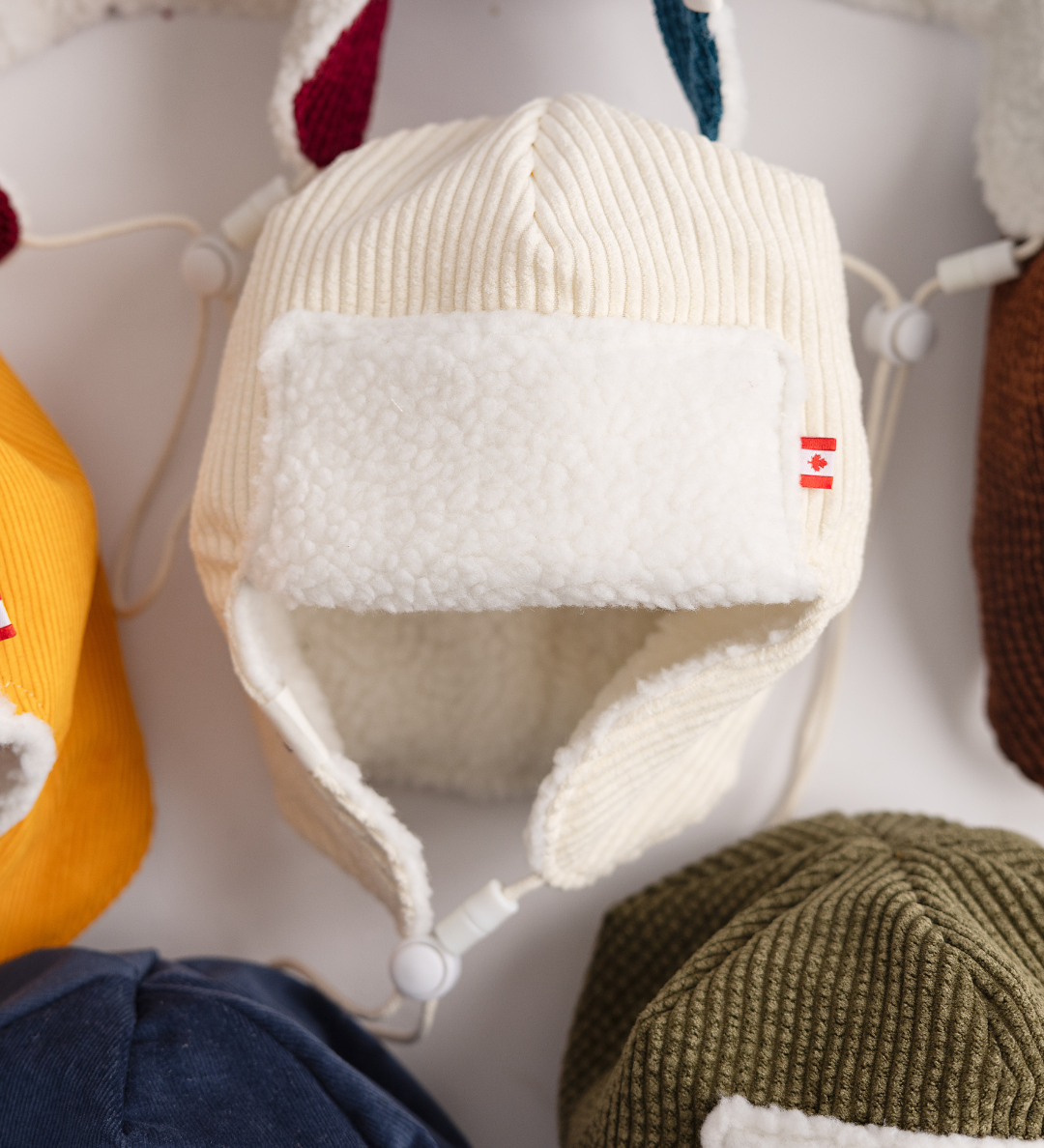 Newbornlander Cream Corduroy Pilot Hat, handmade baby winter hat with cream sherpa ear flaps, Made in Canada