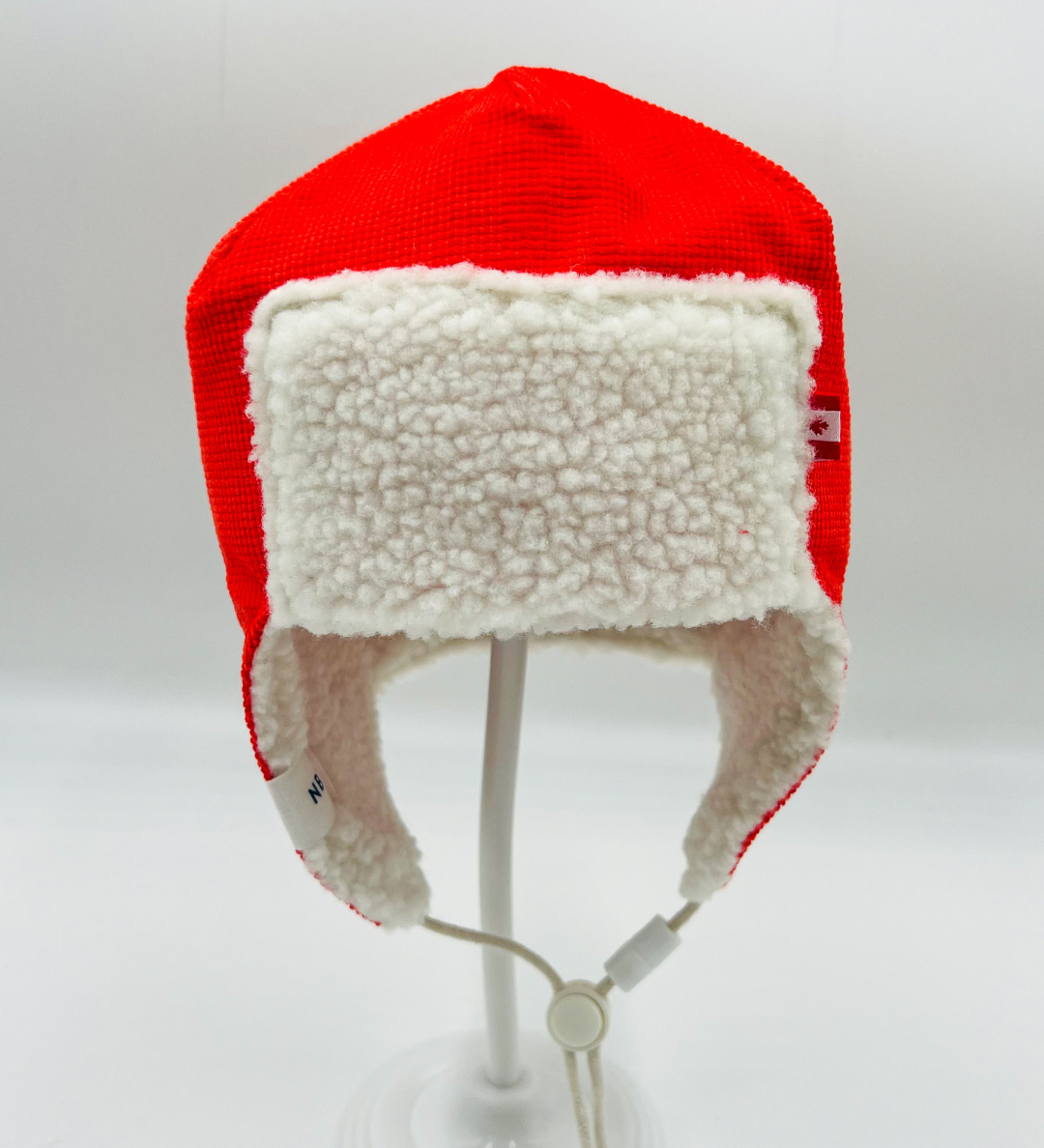 Newbornlander Strong Red Corduroy Pilot Hat, handmade baby winter hat with cream sherpa ear flaps, front view